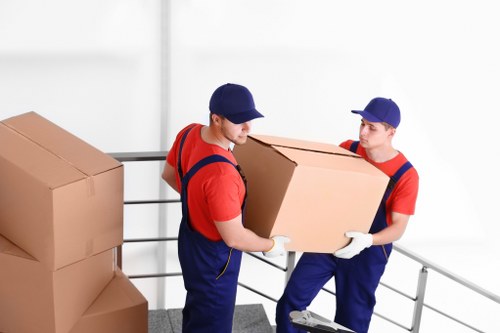 Packed boxes and furniture ready for local removals in Goddington