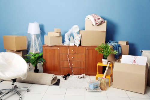 Loading furniture and boxes into a removal van for a Goddington move
