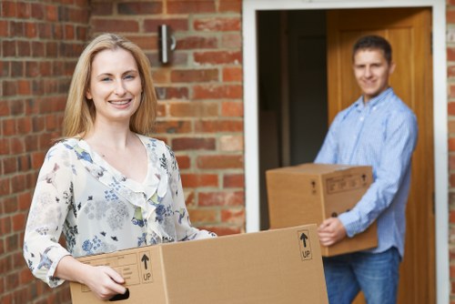 Removal team loading commercial equipment with care