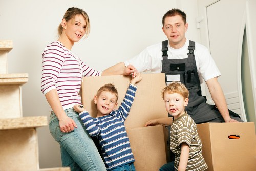 Coordinated office move with labelled boxes and furniture setup