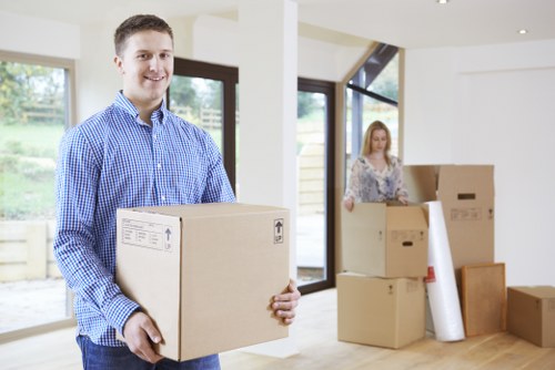 Furniture dismantling and careful loading during a Goddington move