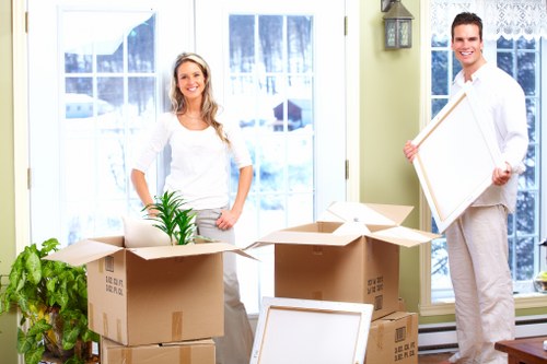 Residential removals team preparing items for transport in Goddington